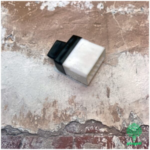 Close-up of Triumph Datatool S3 S4 diagnostic plug used for vehicle diagnostics and security system troubleshooting.