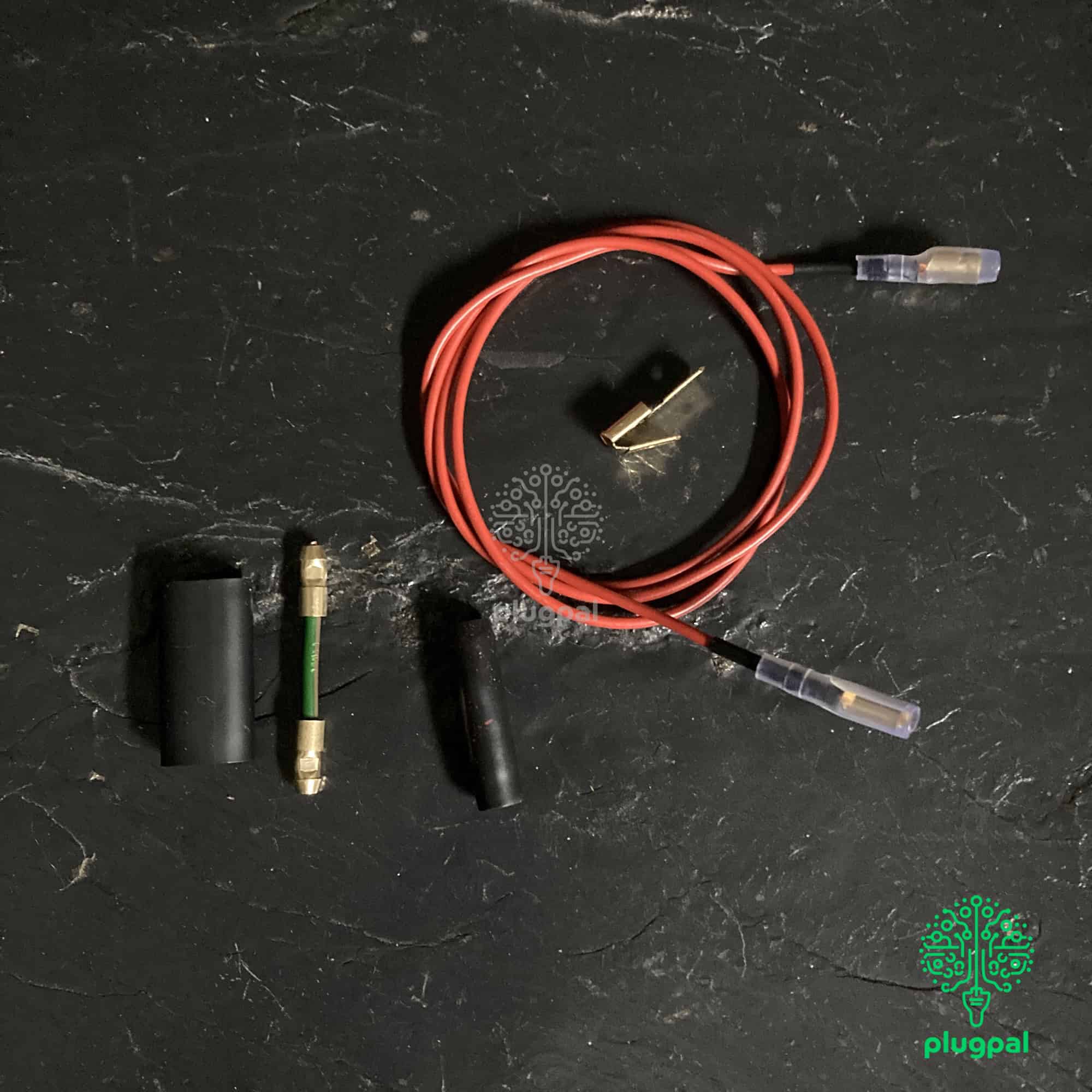 Versatile auto electrical wiring kit with red cabling, connectors, and Fuses, ideal for vehicle diagnostics, repairs, or custom wiring projects, compatible with plugpal systems and tools.