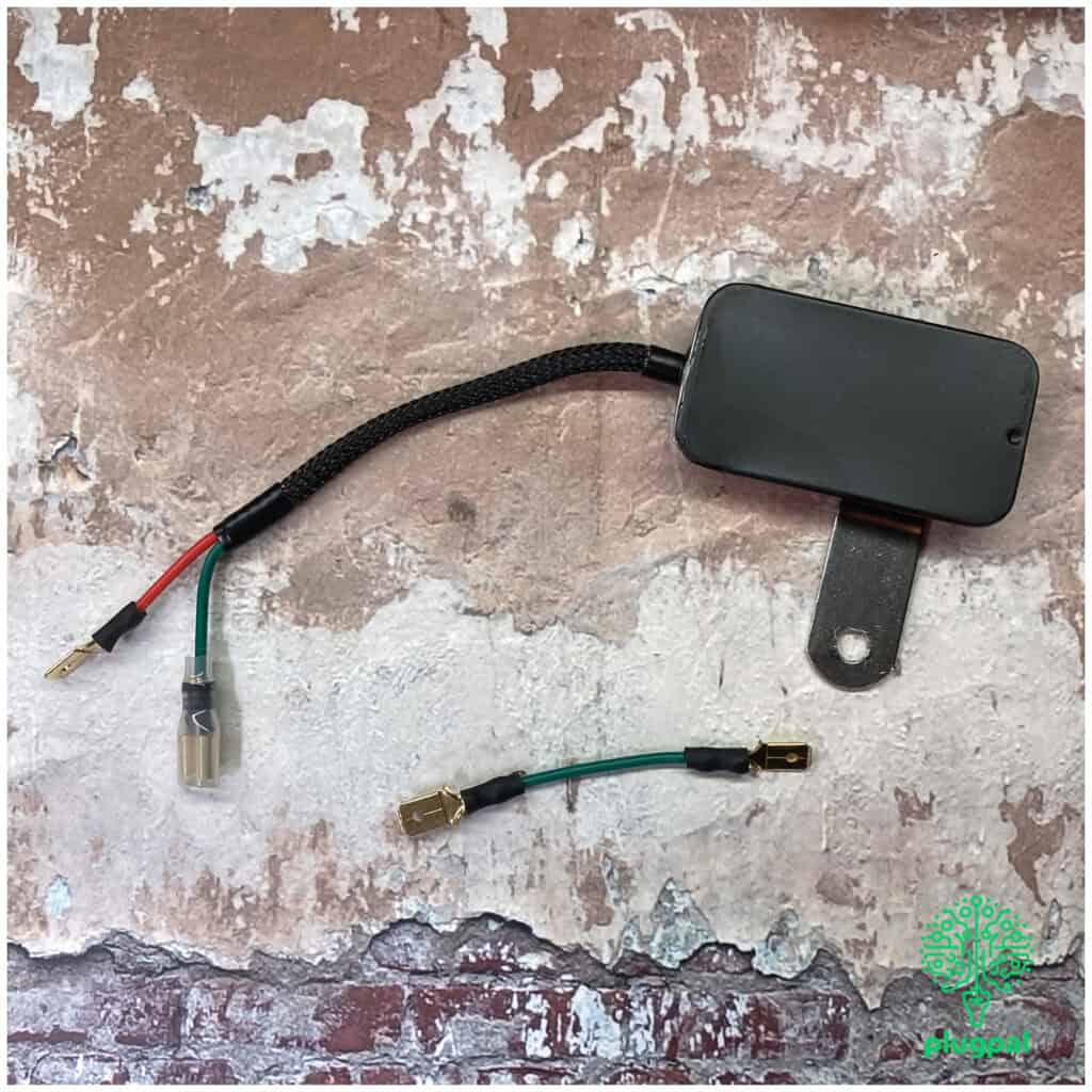 Compact 10V solid state voltage stabiliser with mounting bracket, designed to ensure stable power supply and protect electronic devices from voltage fluctuations.