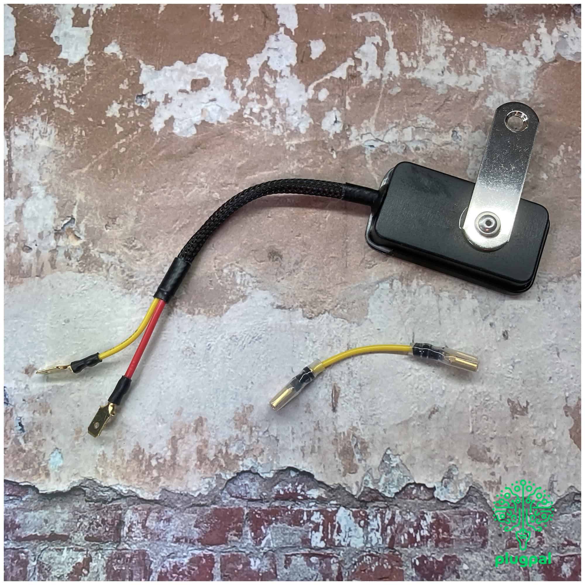 Voltage stabiliser device with mounting bracket for 5V electrical systems and electronics projects.